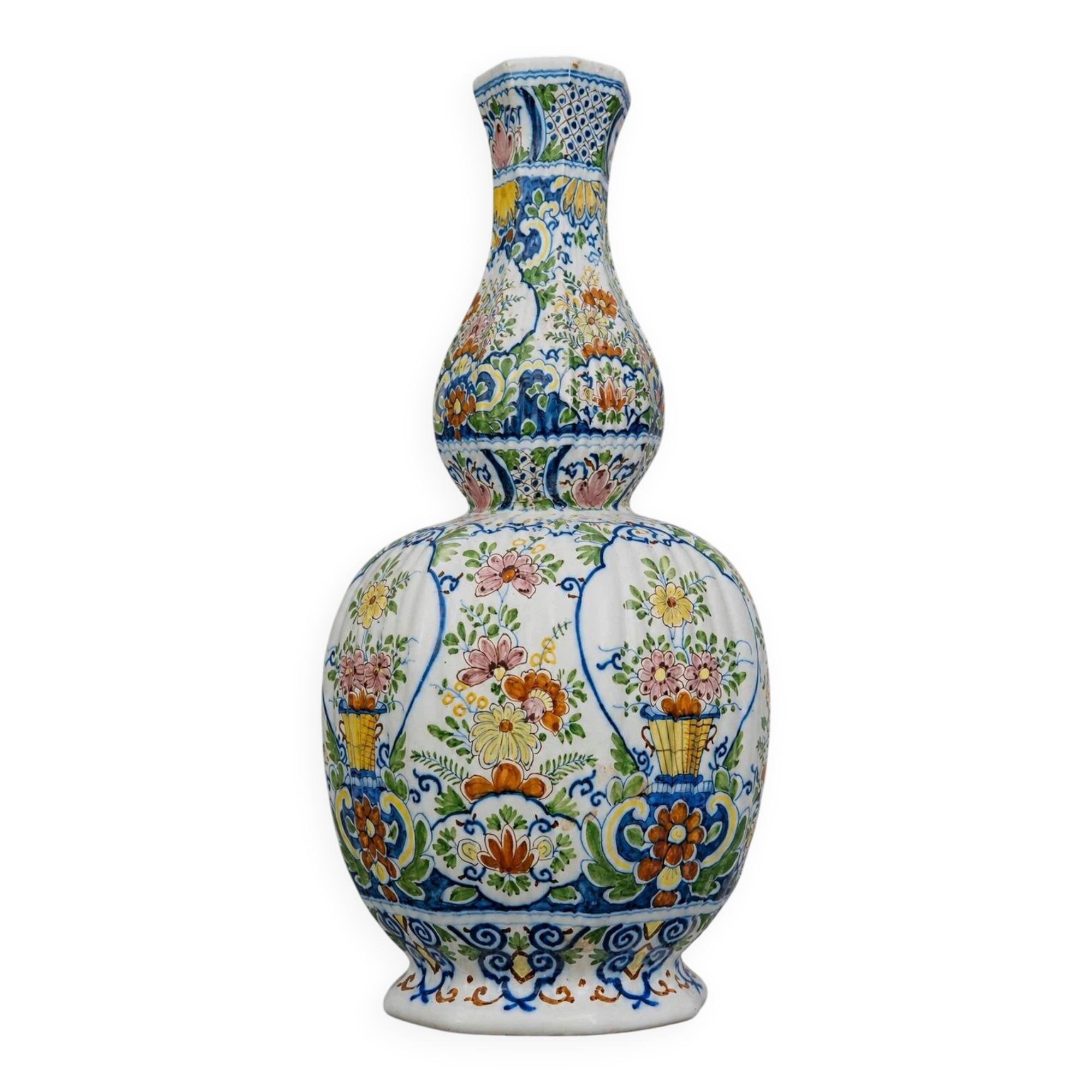 Large earthenware vase with a baluster body and elongated neck, richly decorated.
