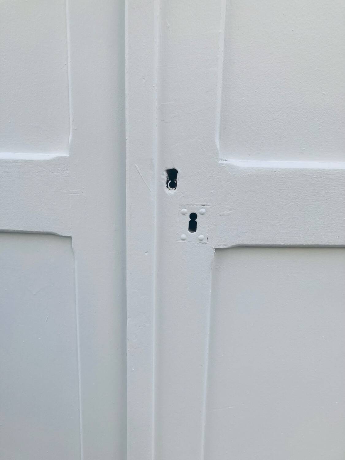 Antique white Parisian wardrobe with Majorelle blue interior