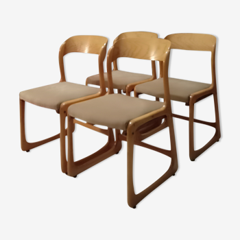 Suite de 4 chaises traineau Baumann