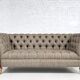 Chesterfield sofa in leather, fabric and wood