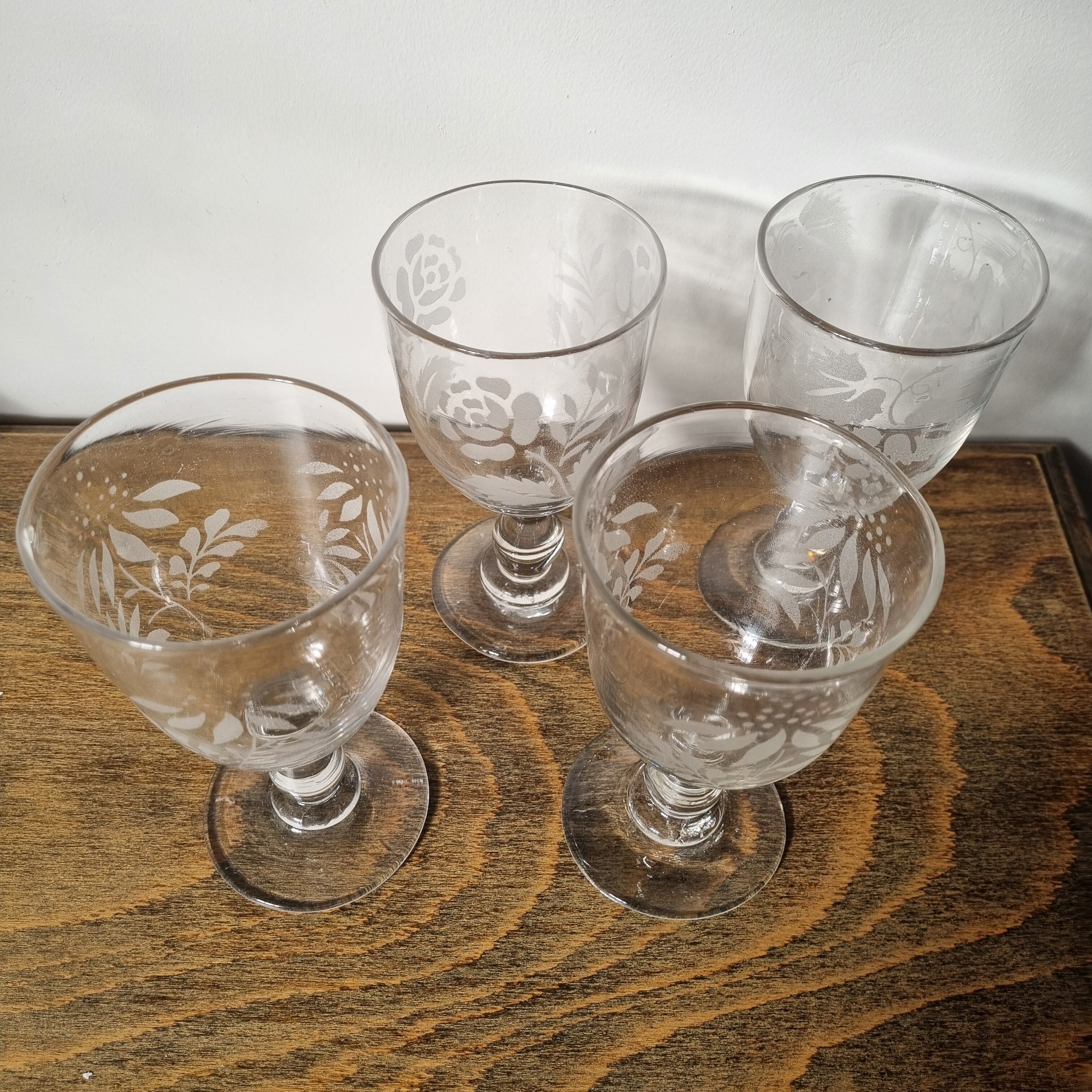 Antique hand-blown and engraved stemmed glasses