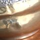 Art Deco brass pot cover