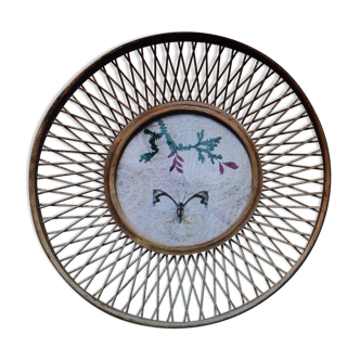 Round rattan frame with floral and butterfly pattern