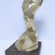 Gilded bronze and sculptural wood paperweight