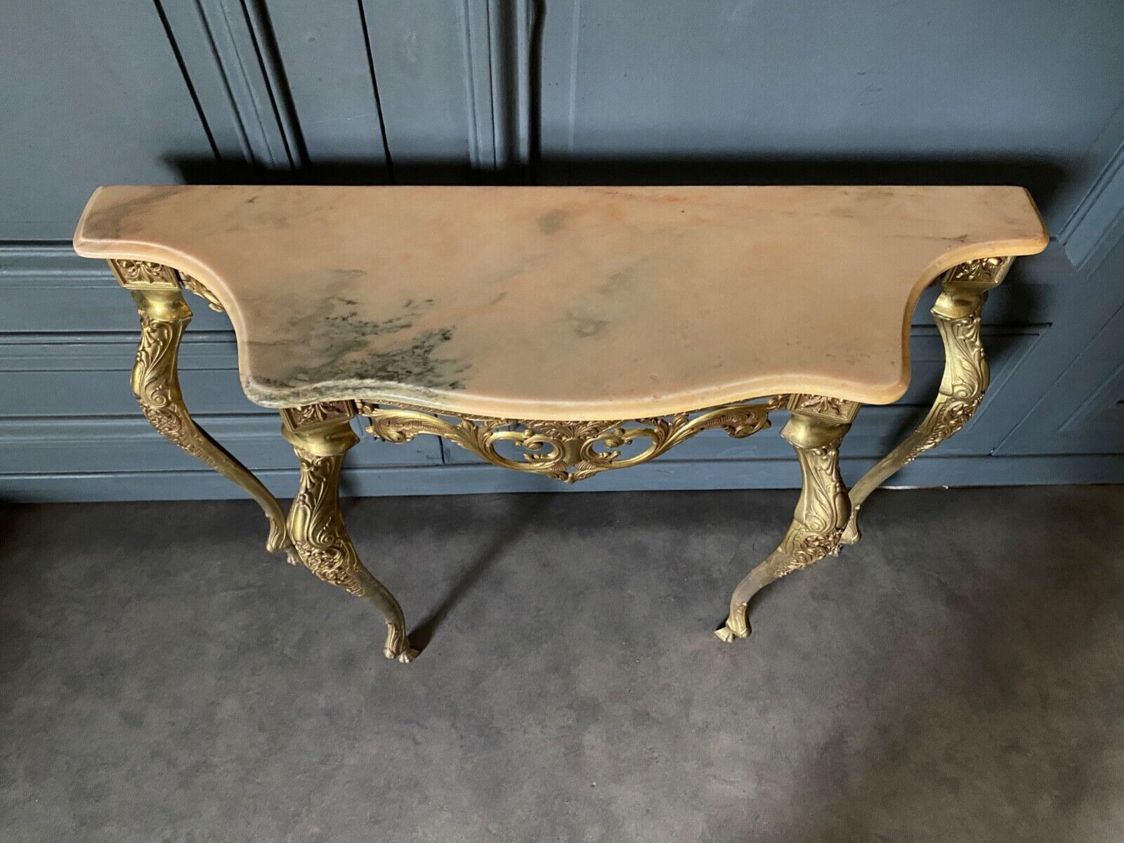 Gilded bronze console Louis XV style and its Mirror Mid-twentieth Marble
