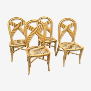 Lot de quatre chaises en rotin