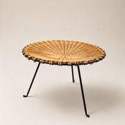 Small vintage tripod stool in woven rattan and black metal, dating from the 1970s.