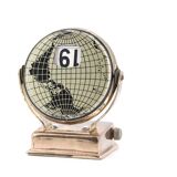 World map perpetual calendar paperweight, 1950s