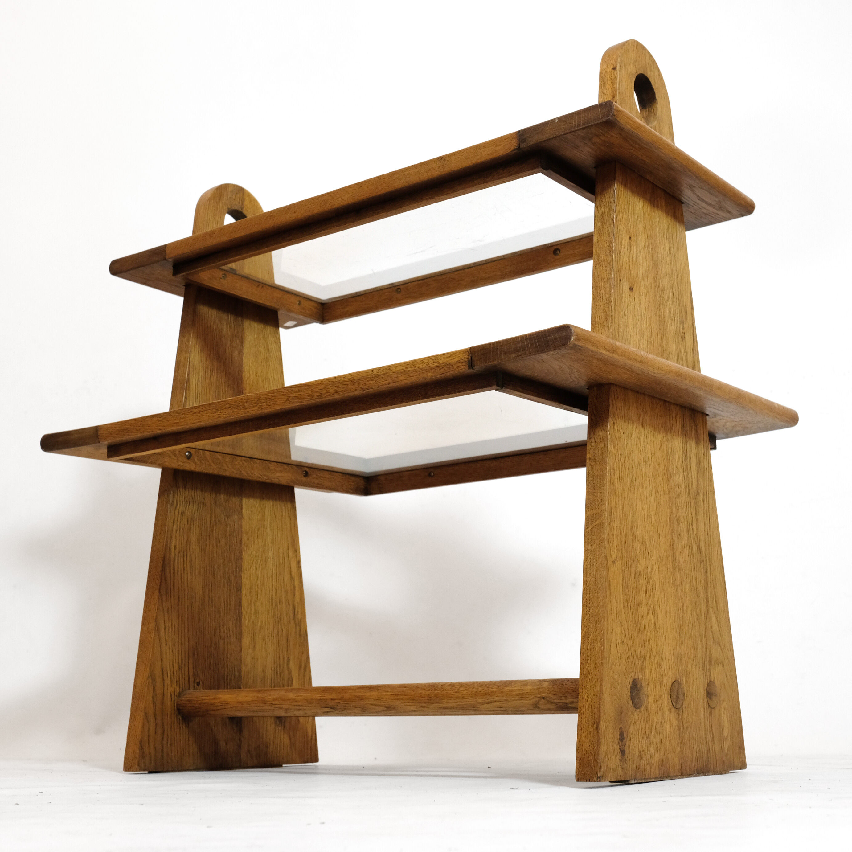 Served in oak and glass from the 50s and 60s.