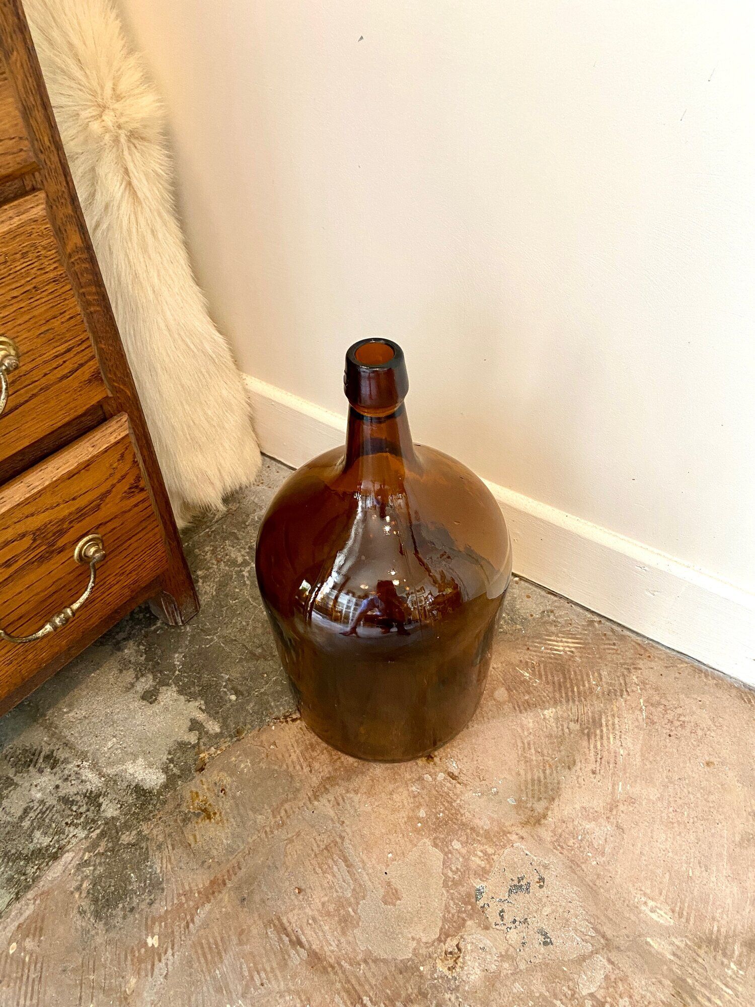 Bonbonne en verre ambré