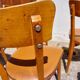 6 vintage 1960s wooden bistro chairs with camel faux leather.