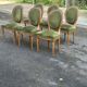 Set of 8 Louis XVI medallion chairs and armchairs in green velvet, 1950.