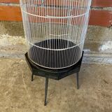 Antique black & white metal bird cage on vintage decorative legs