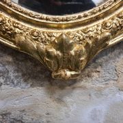 Miroir ovale doré, XIXe siècle