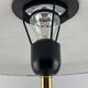 Rare black and gold UFO table lamp by Louis Kalff for Philips.