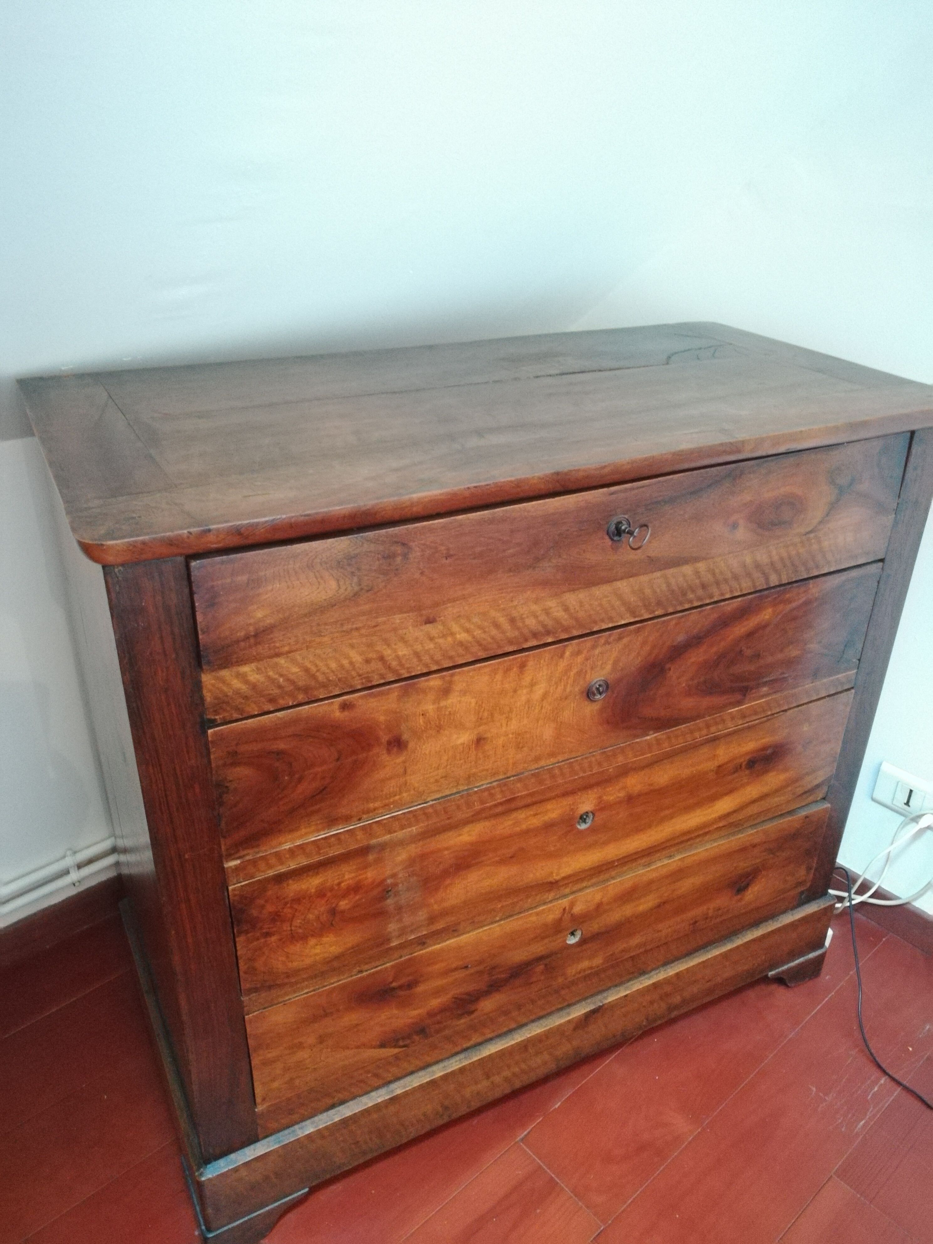 Molded walnut chest of drawers