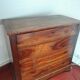 Molded walnut chest of drawers