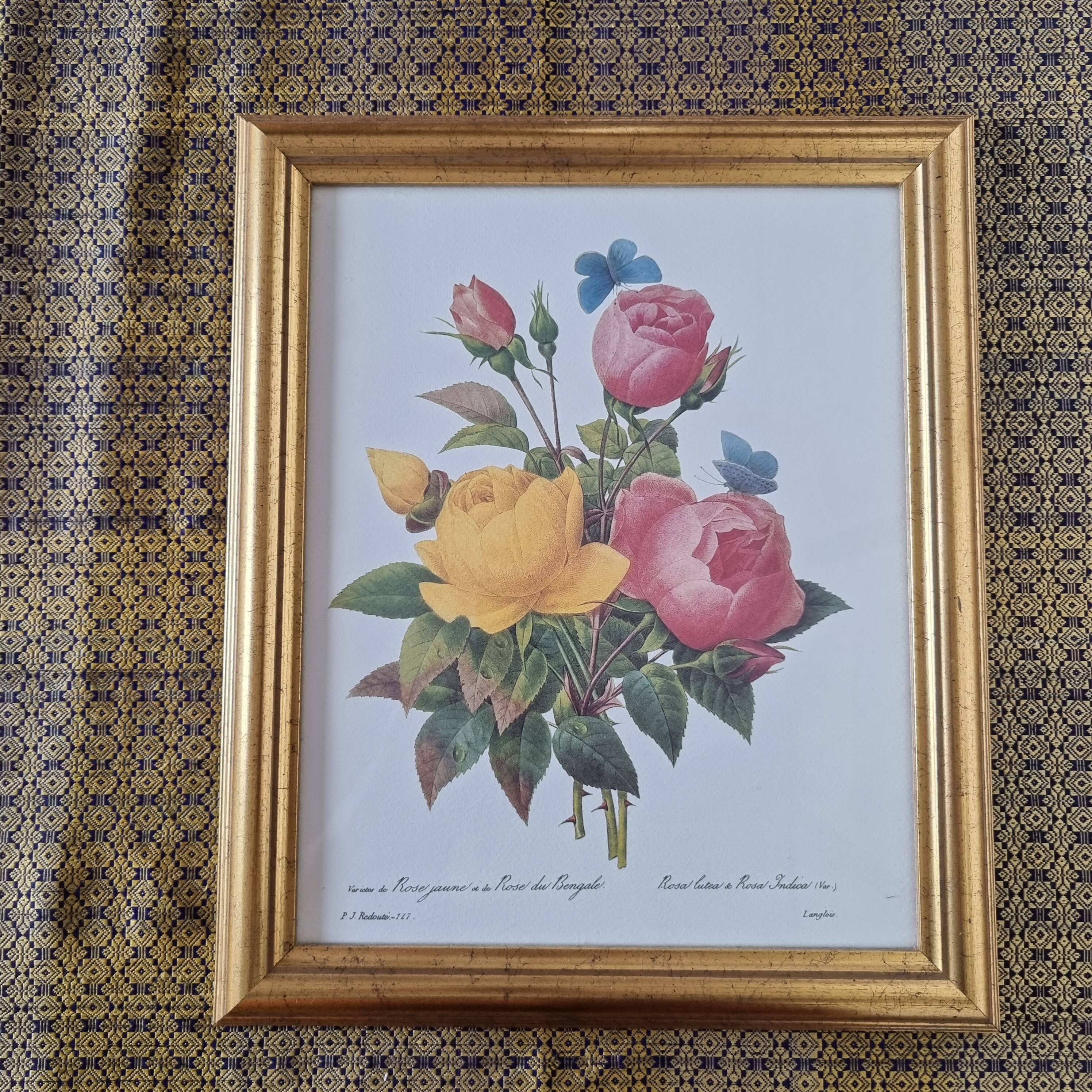 2 paintings with period lithographed flowers and gilded wooden frame.