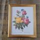 2 paintings with period lithographed flowers and gilded wooden frame.