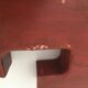 Red metal "F" sign letter