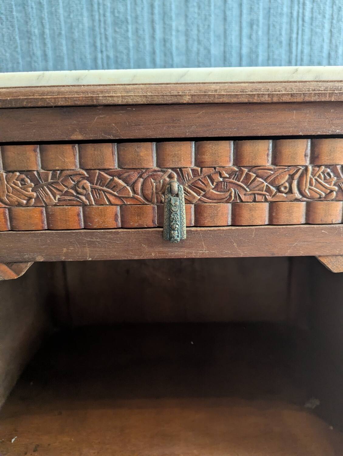 Bedside table with a marble top