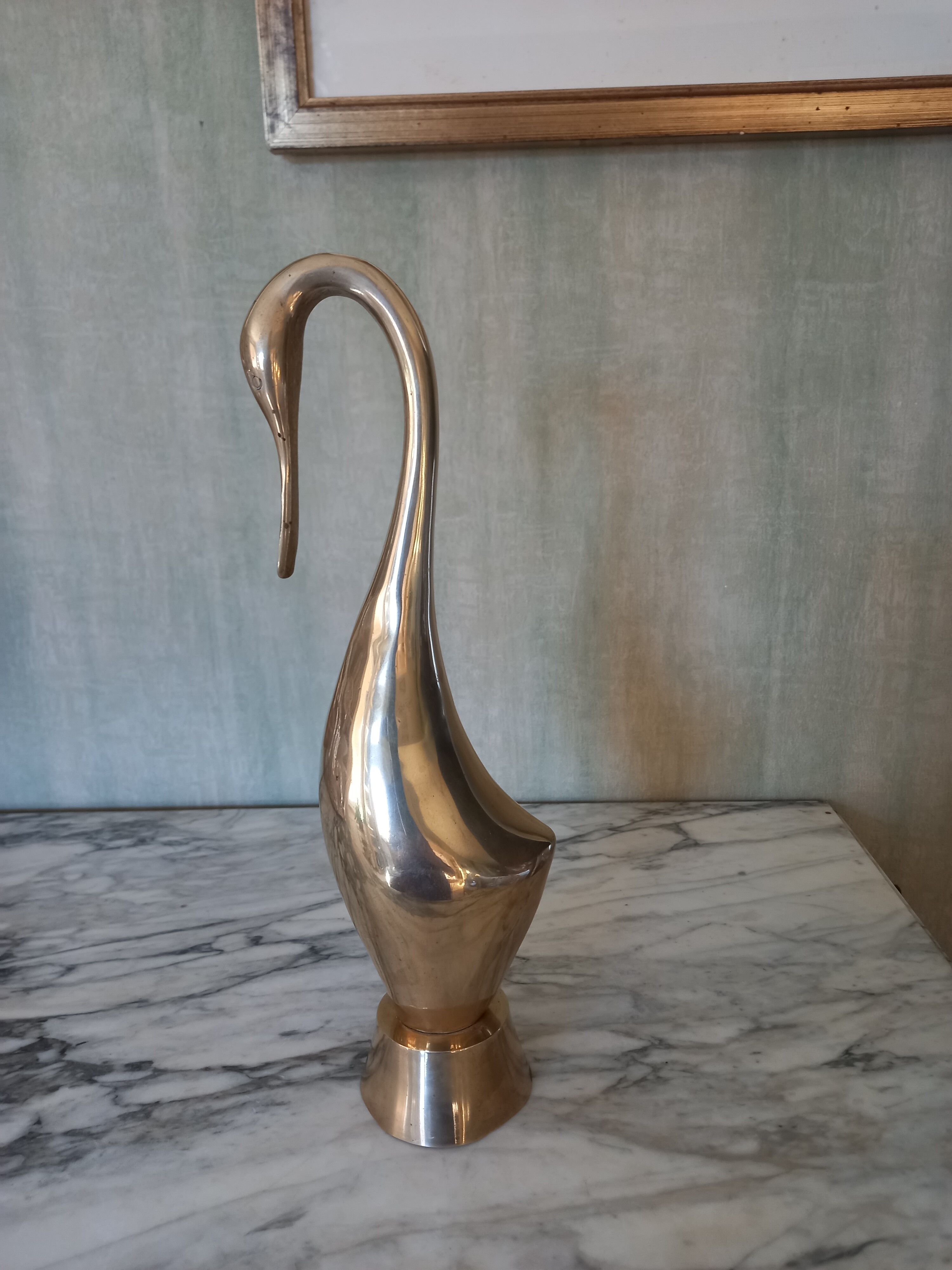 Brass heron