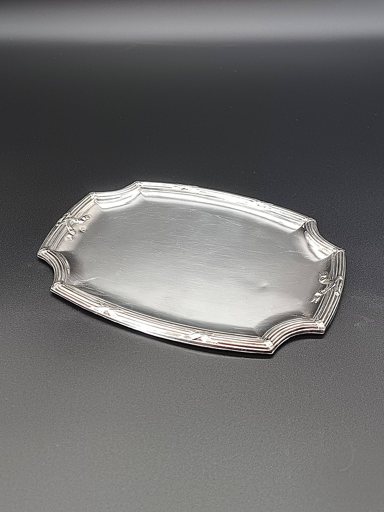 Refined small serving tray or rectangular catch-all with rounded corners.