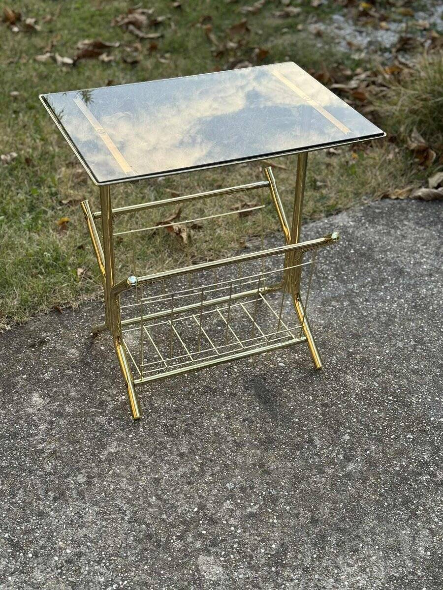 Mid-century modern brass and smoked glass side table with integrated magazine holder, 1970s