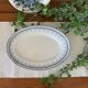 Old oval dish in earthenware by Gien, Byzantium model