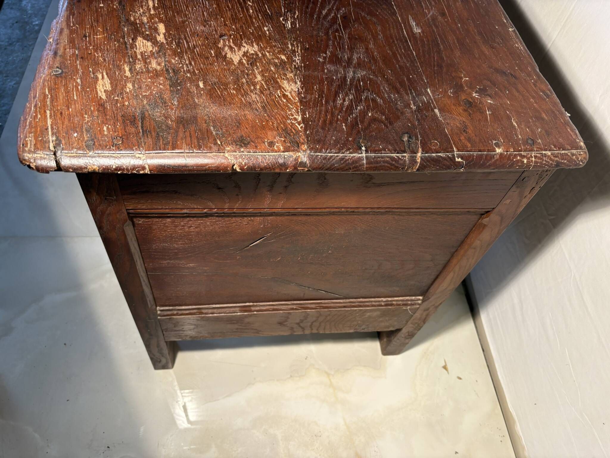 Rustic antique oak chest, original fittings and moulded panels.