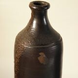 Lot de trois bouteilles anciennes en grès