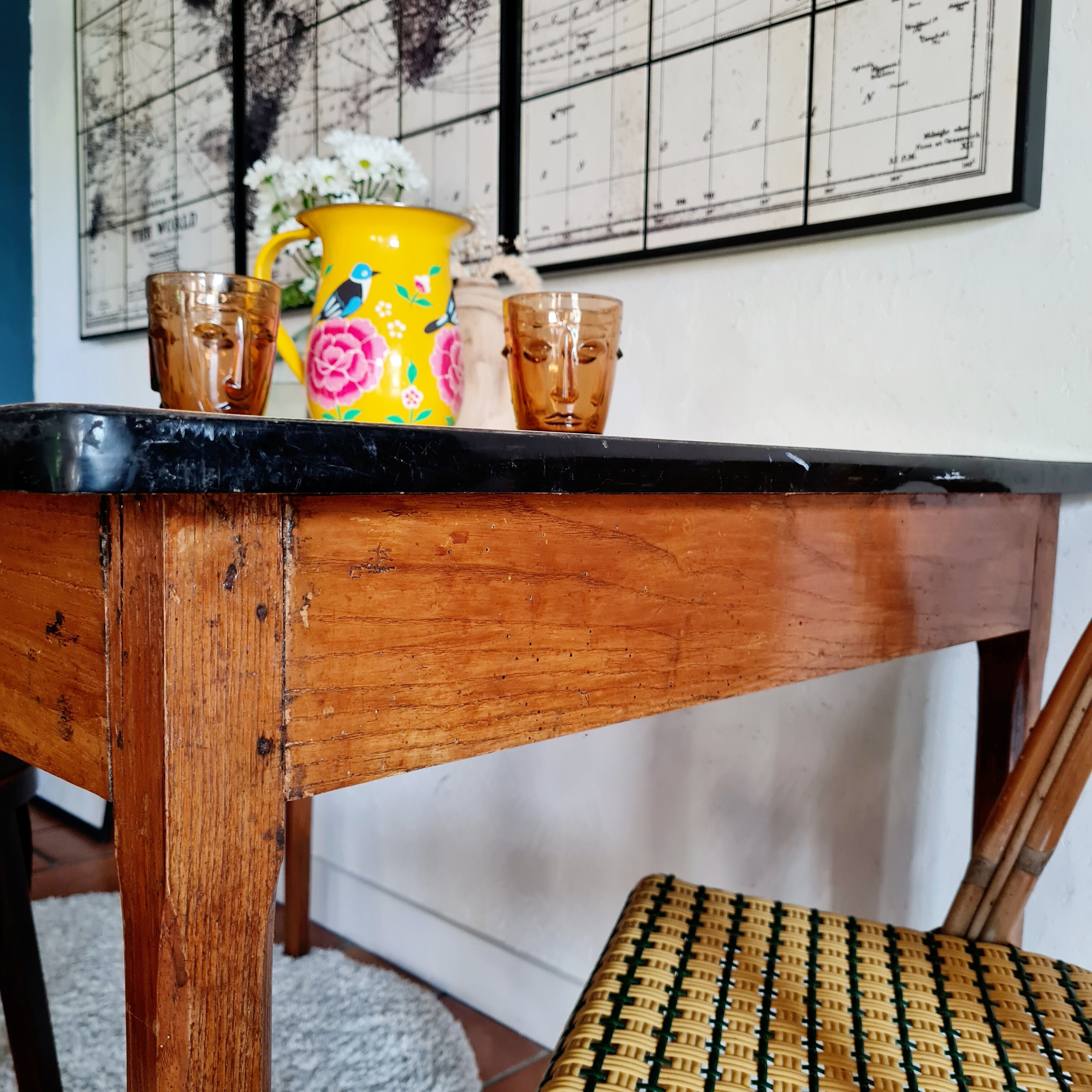 Old wooden farmhouse table and yellow formica top