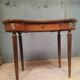 "Kidney" bureau in Louis XVI style veneer.