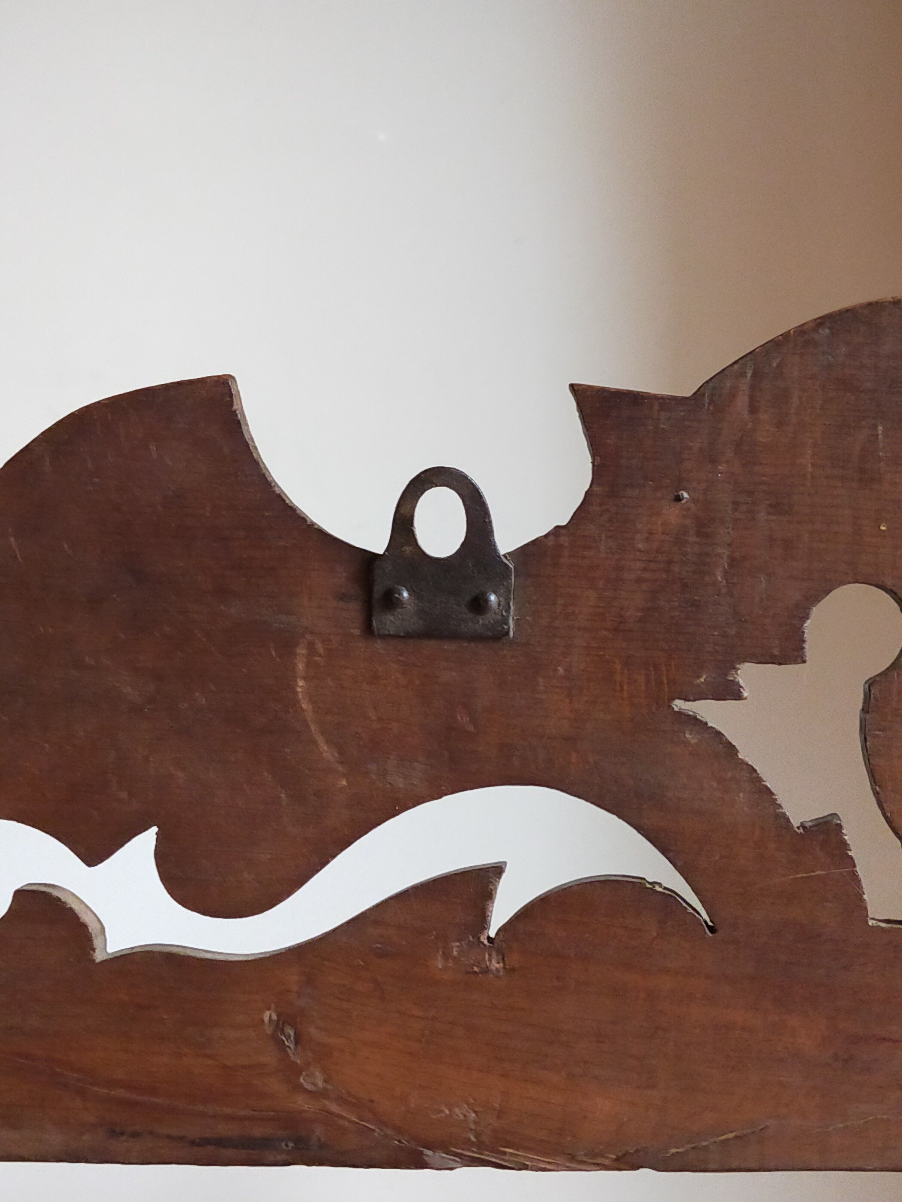 Old carved wooden wall shelf