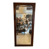 Beveled mirror with wooden contours