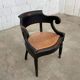 Fauteuil Louis Philippe en bois noir et cuir cognac