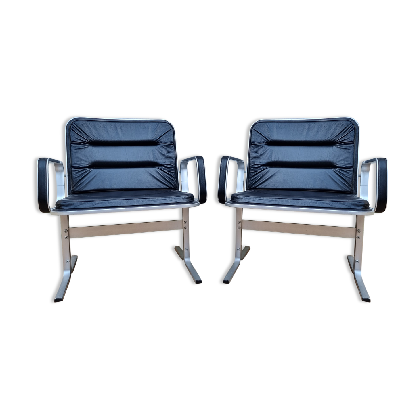 Pair of vintage leather and aluminum armchairs, restored
