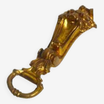 Lion bottle opener in brass