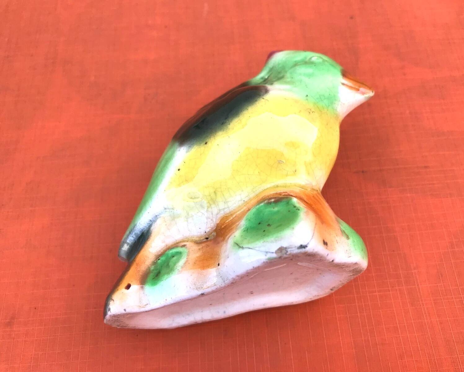 Polychrome ceramic parrot shape