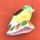Polychrome ceramic parrot shape
