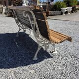 Antique garden bench made of cast iron and oak slats