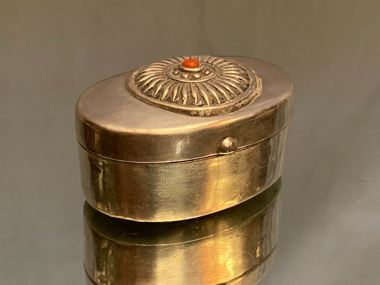 Oval silver box enhanced with coral Middle East India Asia