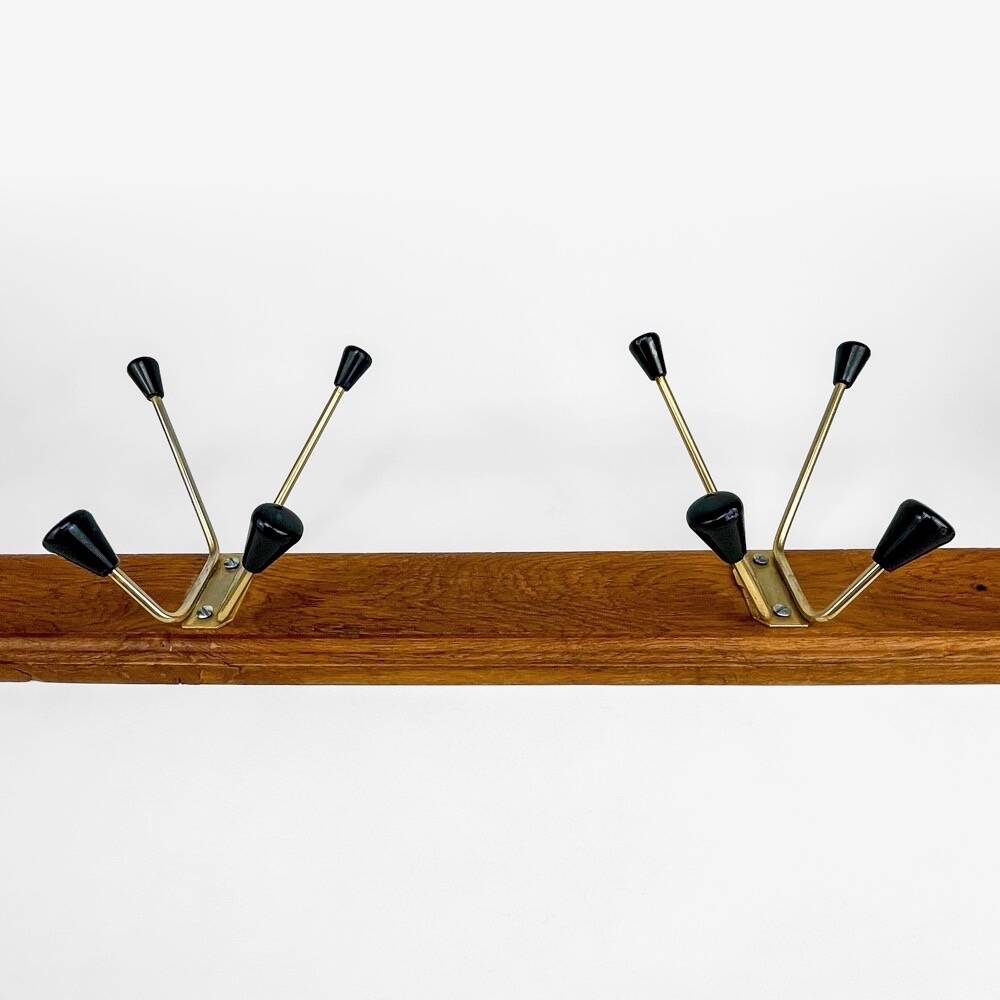 Wall coat rack with golden metal hooks from the 60s