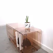 Vintage hifi, LP cabinet, TV unit made of tinted plexiglass on wheels, records.