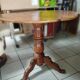 Three-legged side table in solid fruitwood.