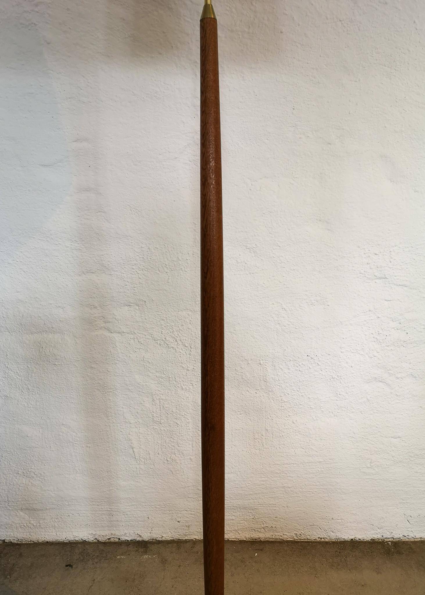 Mid-century floor lamp in teak and brass by Falkenbergs Belysning, Sweden, 1960s.