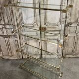 Plexiglass shelf by Pierre Vandel in Hollywood Regency style circa 1970.