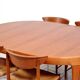 Round dining table in teak by Ib Kofod Larsen for Faarup Mobelfabrik