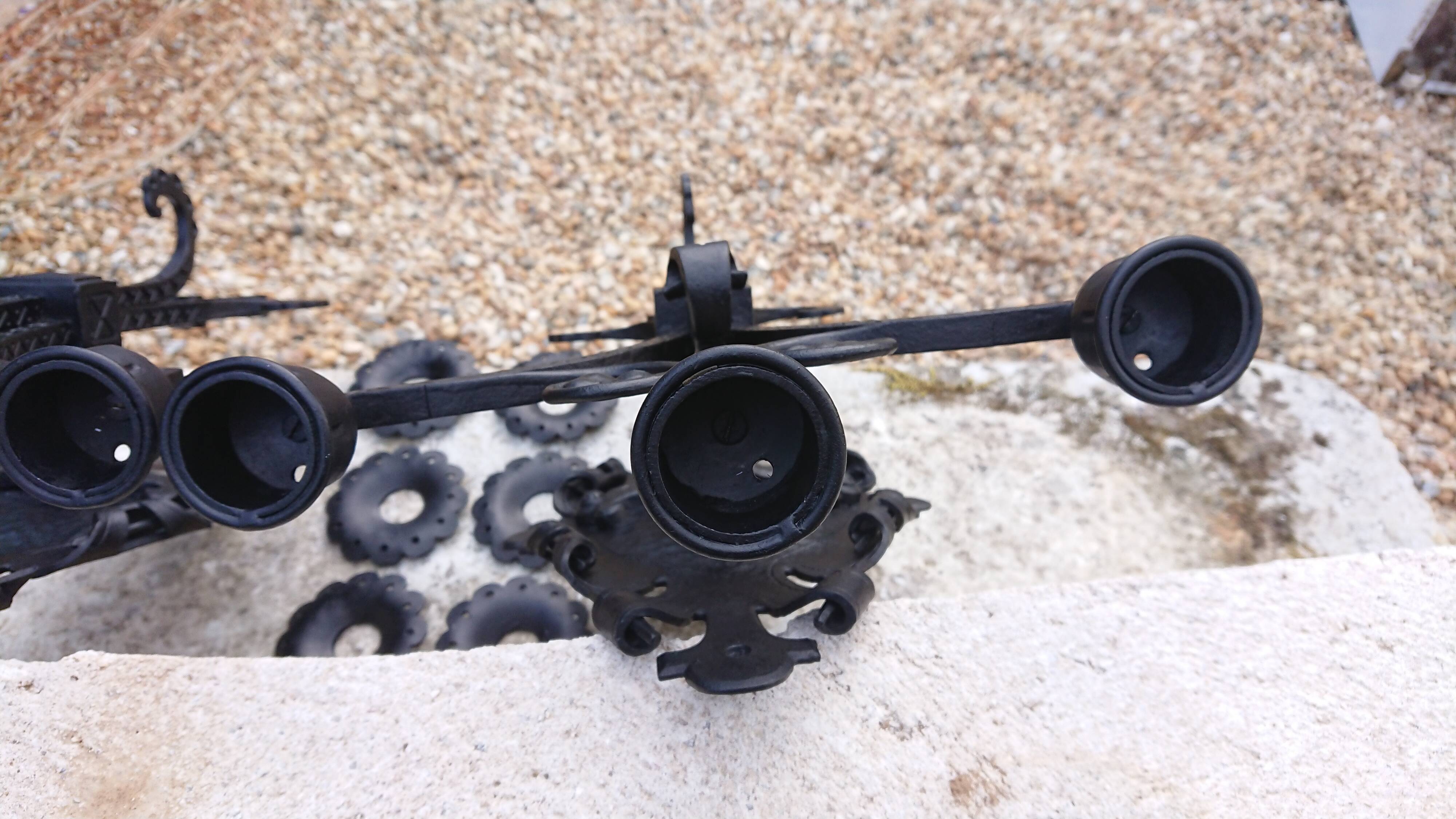 Pair of black wrought iron sconces - neo-Gothic style - from the 1950s