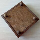 Old wood and ceramic trivet